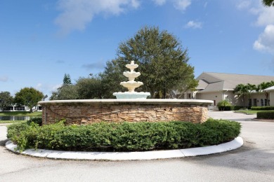 Enjoy peaceful water views and your own Mango Tree from this on Savanna Golf Club in Florida - for sale on GolfHomes.com, golf home, golf lot