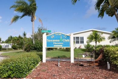 Enjoy peaceful water views and your own Mango Tree from this on Savanna Golf Club in Florida - for sale on GolfHomes.com, golf home, golf lot