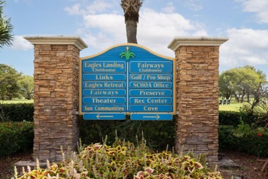Enjoy peaceful water views and your own Mango Tree from this on Savanna Golf Club in Florida - for sale on GolfHomes.com, golf home, golf lot
