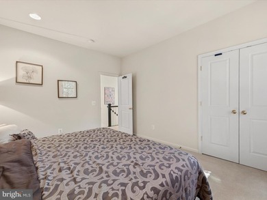 Welcome to 27444 S. Nicklaus Avenue, a refined coastal retreat on The Peninsula Golf and Country Club in Delaware - for sale on GolfHomes.com, golf home, golf lot