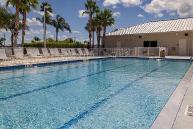 Enjoy peaceful water views and your own Mango Tree from this on Savanna Golf Club in Florida - for sale on GolfHomes.com, golf home, golf lot