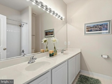 Welcome to 27444 S. Nicklaus Avenue, a refined coastal retreat on The Peninsula Golf and Country Club in Delaware - for sale on GolfHomes.com, golf home, golf lot