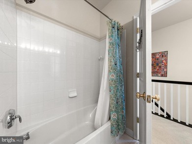 Welcome to 27444 S. Nicklaus Avenue, a refined coastal retreat on The Peninsula Golf and Country Club in Delaware - for sale on GolfHomes.com, golf home, golf lot