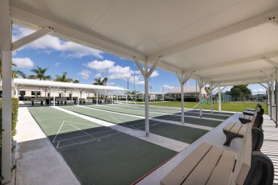 Enjoy peaceful water views and your own Mango Tree from this on Savanna Golf Club in Florida - for sale on GolfHomes.com, golf home, golf lot
