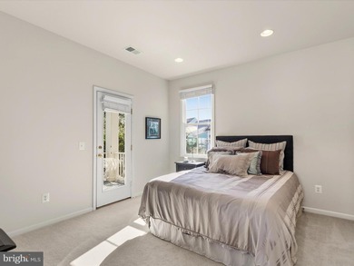 Welcome to 27444 S. Nicklaus Avenue, a refined coastal retreat on The Peninsula Golf and Country Club in Delaware - for sale on GolfHomes.com, golf home, golf lot