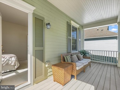 Welcome to 27444 S. Nicklaus Avenue, a refined coastal retreat on The Peninsula Golf and Country Club in Delaware - for sale on GolfHomes.com, golf home, golf lot