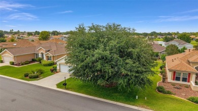 Spacious and thoughtfully designed, this popular Sanibel model on Eagle Ridge At Spruce Creek Country Club in Florida - for sale on GolfHomes.com, golf home, golf lot