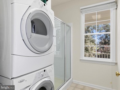 Welcome to 27444 S. Nicklaus Avenue, a refined coastal retreat on The Peninsula Golf and Country Club in Delaware - for sale on GolfHomes.com, golf home, golf lot