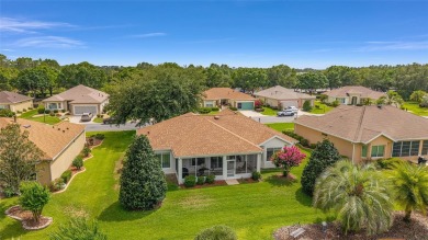 Spacious and thoughtfully designed, this popular Sanibel model on Eagle Ridge At Spruce Creek Country Club in Florida - for sale on GolfHomes.com, golf home, golf lot
