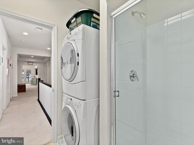 Welcome to 27444 S. Nicklaus Avenue, a refined coastal retreat on The Peninsula Golf and Country Club in Delaware - for sale on GolfHomes.com, golf home, golf lot