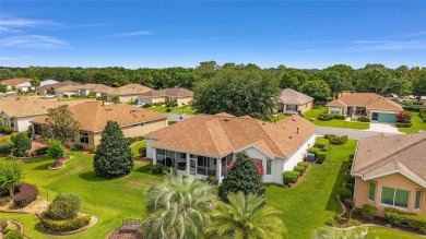 Spacious and thoughtfully designed, this popular Sanibel model on Eagle Ridge At Spruce Creek Country Club in Florida - for sale on GolfHomes.com, golf home, golf lot