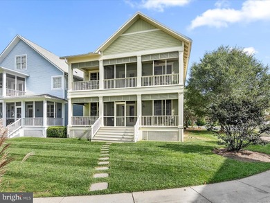 Welcome to 27444 S. Nicklaus Avenue, a refined coastal retreat on The Peninsula Golf and Country Club in Delaware - for sale on GolfHomes.com, golf home, golf lot