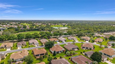 Spacious and thoughtfully designed, this popular Sanibel model on Eagle Ridge At Spruce Creek Country Club in Florida - for sale on GolfHomes.com, golf home, golf lot