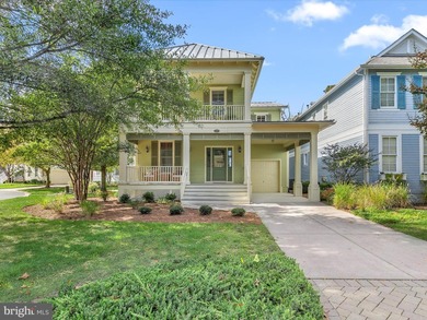 Welcome to 27444 S. Nicklaus Avenue, a refined coastal retreat on The Peninsula Golf and Country Club in Delaware - for sale on GolfHomes.com, golf home, golf lot