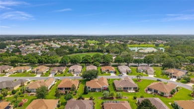 Spacious and thoughtfully designed, this popular Sanibel model on Eagle Ridge At Spruce Creek Country Club in Florida - for sale on GolfHomes.com, golf home, golf lot