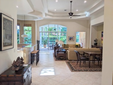 This beautifully designed single-story home is 4 BR plus office on BallenIsles Golf and Country Club in Florida - for sale on GolfHomes.com, golf home, golf lot