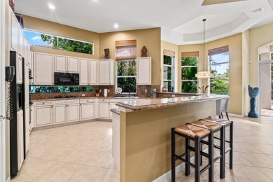 This beautifully designed single-story home is 4 BR plus office on BallenIsles Golf and Country Club in Florida - for sale on GolfHomes.com, golf home, golf lot