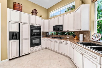 This beautifully designed single-story home is 4 BR plus office on BallenIsles Golf and Country Club in Florida - for sale on GolfHomes.com, golf home, golf lot