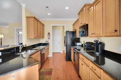 BRAND NEW ROOF (2025) WITH LEAFFILTER GUTTERS AND TRANSFERRABLE on Magnolia Greens Golf Plantation in North Carolina - for sale on GolfHomes.com, golf home, golf lot