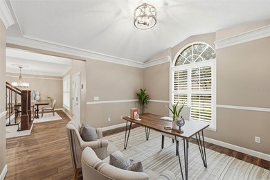 Under contract-accepting backup offers. Classic Tuskawilla Pool on Tuscawilla Country Club in Florida - for sale on GolfHomes.com, golf home, golf lot