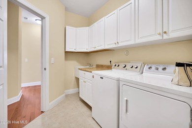 BRAND NEW ROOF (2025) WITH LEAFFILTER GUTTERS AND TRANSFERRABLE on Magnolia Greens Golf Plantation in North Carolina - for sale on GolfHomes.com, golf home, golf lot