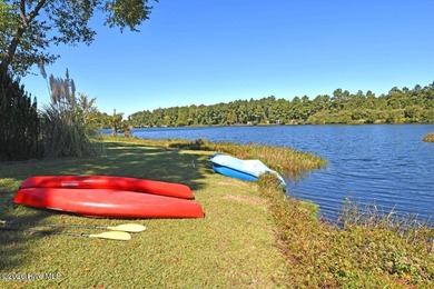 BRAND NEW ROOF (2025) WITH LEAFFILTER GUTTERS AND TRANSFERRABLE on Magnolia Greens Golf Plantation in North Carolina - for sale on GolfHomes.com, golf home, golf lot