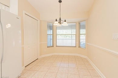 Welcome to this beautifully maintained second-floor veranda on Naples Heritage Golf and Country Club in Florida - for sale on GolfHomes.com, golf home, golf lot