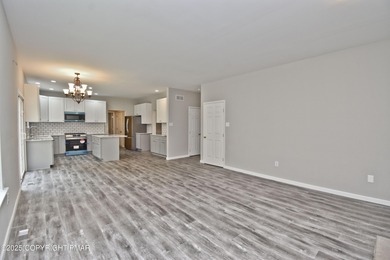 COMPLETELY RENOVATED & MOVE-IN READY! This STUNNING 4bd/2.5ba on Country Club of the Poconos Golf Course in Pennsylvania - for sale on GolfHomes.com, golf home, golf lot