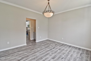 COMPLETELY RENOVATED & MOVE-IN READY! This STUNNING 4bd/2.5ba on Country Club of the Poconos Golf Course in Pennsylvania - for sale on GolfHomes.com, golf home, golf lot