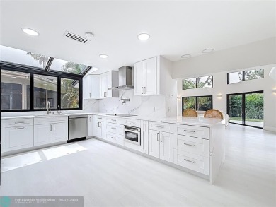 Welcome to this beautifully renovated 5BD/2.5BA home in Seagate on Hamlet Country Club in Florida - for sale on GolfHomes.com, golf home, golf lot