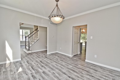 COMPLETELY RENOVATED & MOVE-IN READY! This STUNNING 4bd/2.5ba on Country Club of the Poconos Golf Course in Pennsylvania - for sale on GolfHomes.com, golf home, golf lot