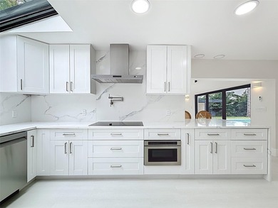 Welcome to this beautifully renovated 5BD/2.5BA home in Seagate on  in Florida - for sale on GolfHomes.com, golf home, golf lot