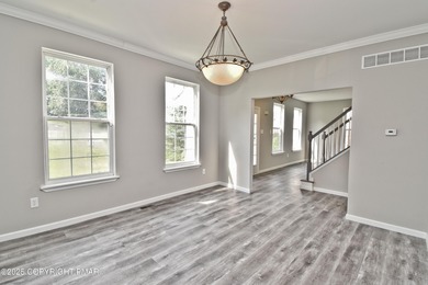 COMPLETELY RENOVATED & MOVE-IN READY! This STUNNING 4bd/2.5ba on Country Club of the Poconos Golf Course in Pennsylvania - for sale on GolfHomes.com, golf home, golf lot