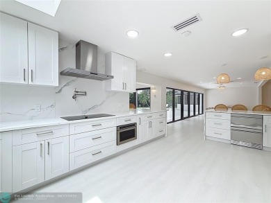 Welcome to this beautifully renovated 5BD/2.5BA home in Seagate on Hamlet Country Club in Florida - for sale on GolfHomes.com, golf home, golf lot