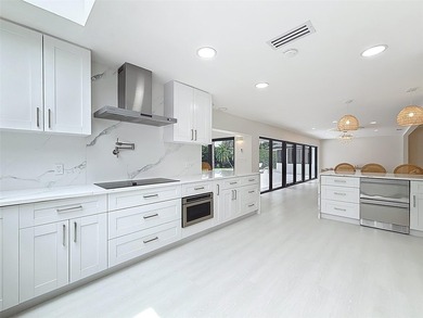 Welcome to this beautifully renovated 5BD/2.5BA home in Seagate on  in Florida - for sale on GolfHomes.com, golf home, golf lot