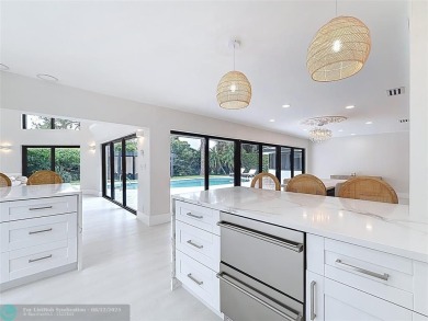 Welcome to this beautifully renovated 5BD/2.5BA home in Seagate on Hamlet Country Club in Florida - for sale on GolfHomes.com, golf home, golf lot