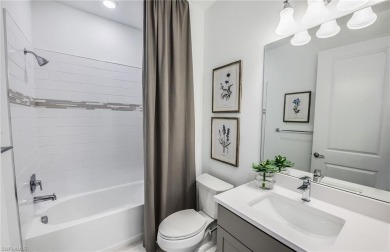 Step into refined comfort with this beautifully upgraded on River Hall Country Club in Florida - for sale on GolfHomes.com, golf home, golf lot