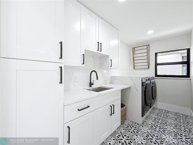 Welcome to this beautifully renovated 5BD/2.5BA home in Seagate on Hamlet Country Club in Florida - for sale on GolfHomes.com, golf home, golf lot