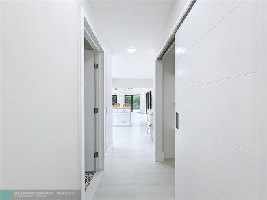 Welcome to this beautifully renovated 5BD/2.5BA home in Seagate on Hamlet Country Club in Florida - for sale on GolfHomes.com, golf home, golf lot