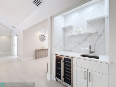 Welcome to this beautifully renovated 5BD/2.5BA home in Seagate on Hamlet Country Club in Florida - for sale on GolfHomes.com, golf home, golf lot