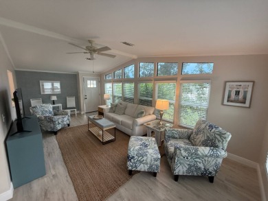 This beautiful 2-bedroom, 2-bathroom Palm Harbor home is being on Del Tura Golf and Country Club in Florida - for sale on GolfHomes.com, golf home, golf lot