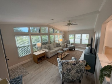 This beautiful 2-bedroom, 2-bathroom Palm Harbor home is being on Del Tura Golf and Country Club in Florida - for sale on GolfHomes.com, golf home, golf lot