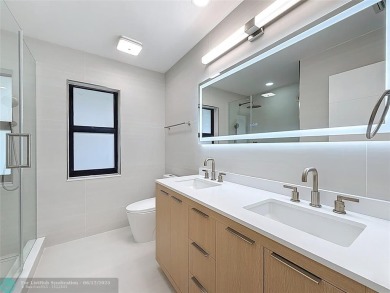 Welcome to this beautifully renovated 5BD/2.5BA home in Seagate on Hamlet Country Club in Florida - for sale on GolfHomes.com, golf home, golf lot