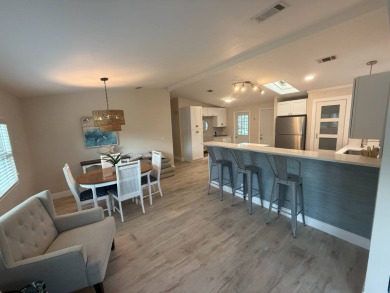 This beautiful 2-bedroom, 2-bathroom Palm Harbor home is being on Del Tura Golf and Country Club in Florida - for sale on GolfHomes.com, golf home, golf lot