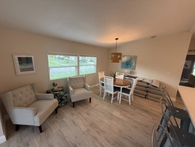 This beautiful 2-bedroom, 2-bathroom Palm Harbor home is being on Del Tura Golf and Country Club in Florida - for sale on GolfHomes.com, golf home, golf lot
