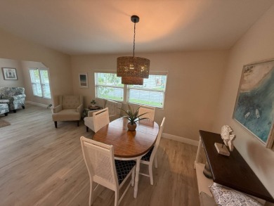 This beautiful 2-bedroom, 2-bathroom Palm Harbor home is being on Del Tura Golf and Country Club in Florida - for sale on GolfHomes.com, golf home, golf lot