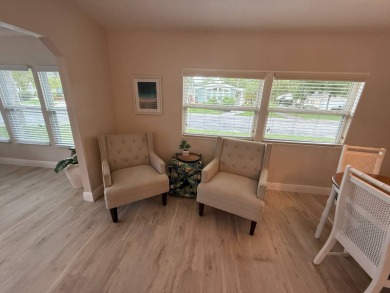 This beautiful 2-bedroom, 2-bathroom Palm Harbor home is being on Del Tura Golf and Country Club in Florida - for sale on GolfHomes.com, golf home, golf lot