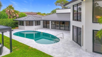 Welcome to this beautifully renovated 5BD/2.5BA home in Seagate on Hamlet Country Club in Florida - for sale on GolfHomes.com, golf home, golf lot