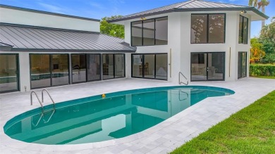 Welcome to this beautifully renovated 5BD/2.5BA home in Seagate on Hamlet Country Club in Florida - for sale on GolfHomes.com, golf home, golf lot