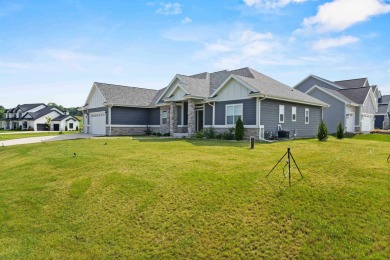 Welcome to this exquisite 4-bedroom, 3.5-bathroom rare on Tumbledown Trails Golf Course in Wisconsin - for sale on GolfHomes.com, golf home, golf lot